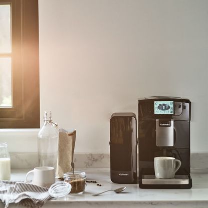 Cuisinart Veloce coffee machine on marble kitchen counter