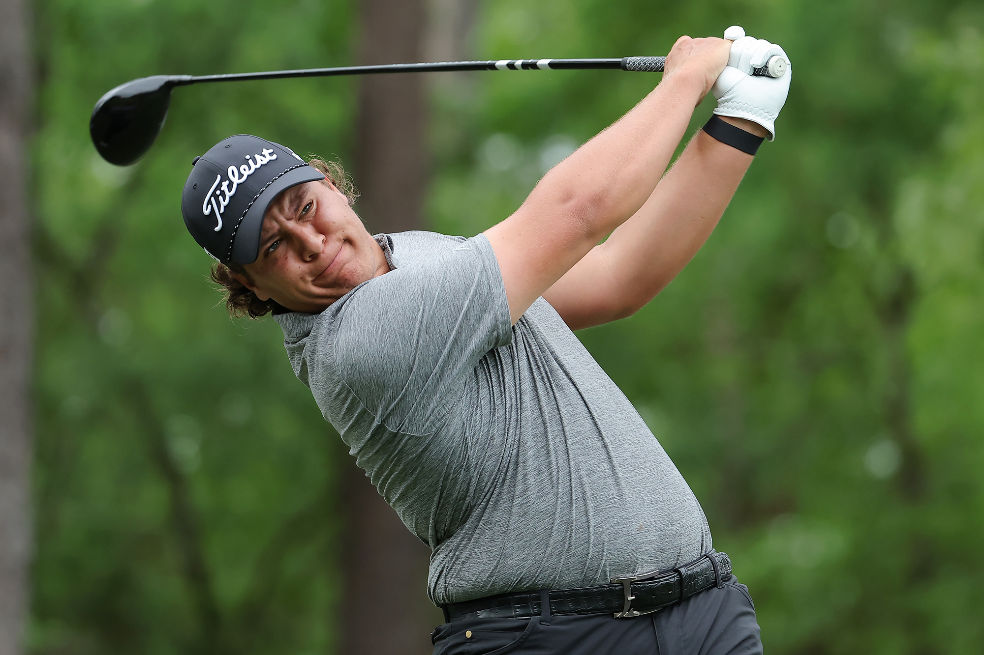 Aldrich Potgieter in the finish position after hitting a driver on the tee box at a PGA Tour event