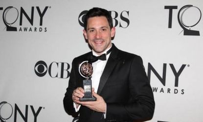 Steve Kazee holds his Tony Award that he won for best actor for his role in the play "Once" on June 10.