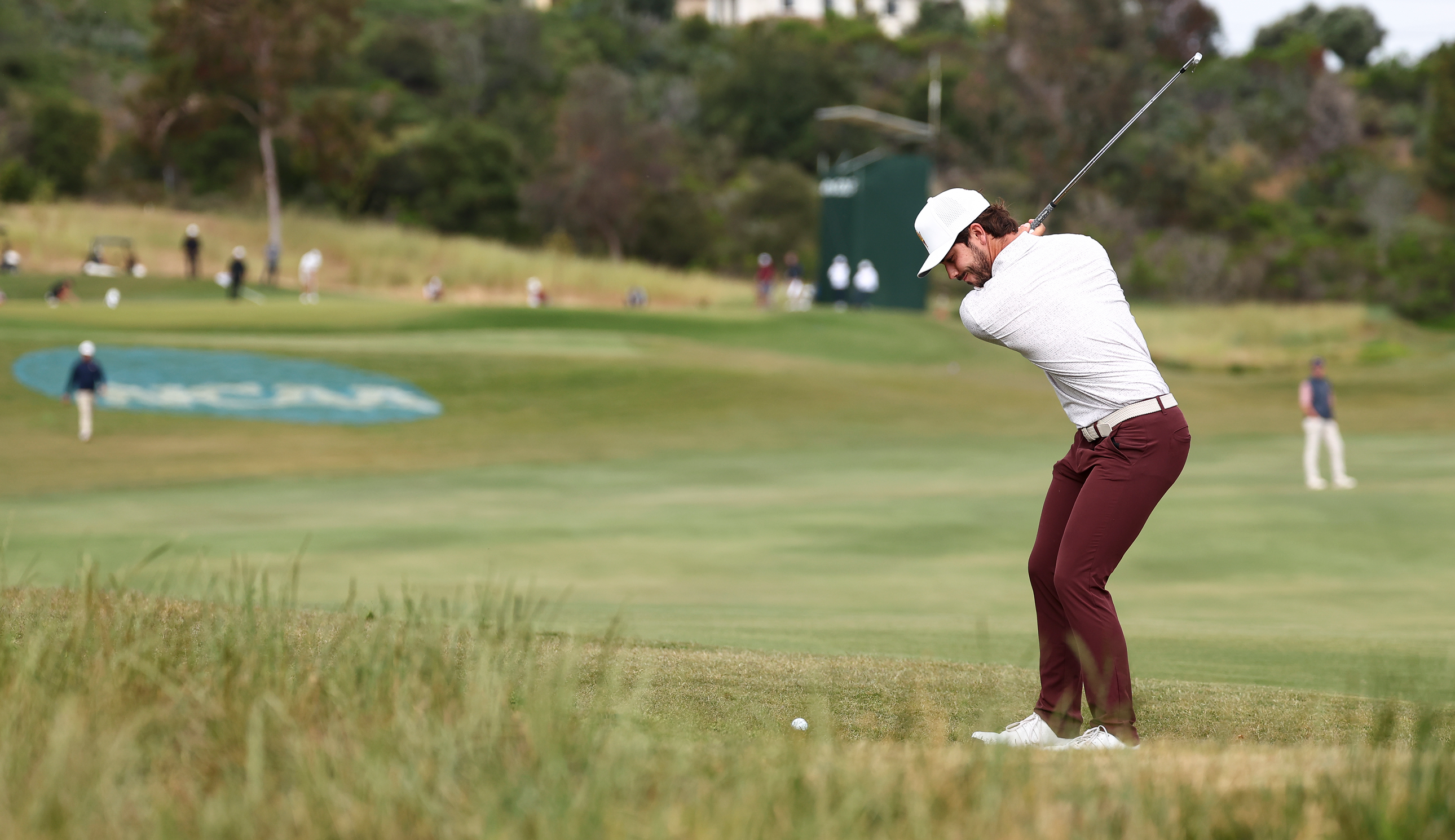 Josele Ballester hits a shot from the rough