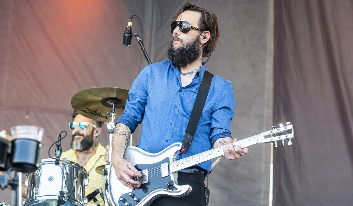 Creighton Barrett (left, background) and Ben Bridwell of Band of Horses perform during the 2021 Railbird Festival at Keeneland Racecourse on August 29, 2021 in Lexington, Kentucky