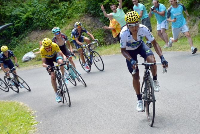 Nairo Quintana (Movistar) attacks to put pressure on Tour leader Chris Froome (Sky)