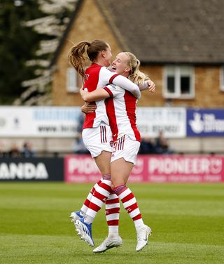 Arsenal's Beth Mead celebrates scoring her side’s fourth goal of the game with team-mate Catlin Foord