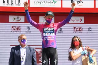 VILLADIEGO SPAIN JULY 29 Podium Felix Grossschartner of Austria and Team BoraHansgrohe Purple Leader Jersey Celebration Hostess Miss during the 42nd Vuelta a Burgos 2020 Stage 2 a 168km stage from Castrojeriz to Villadiego VueltaBurgos on July 29 2020 in Villadiego Spain Photo by David RamosGetty Images