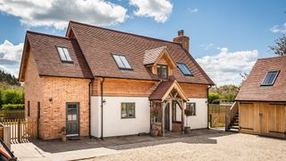 exterior of oak frame modern country home