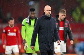 Erik ten Hag, Manager of Manchester United, looks dejected after the team's defeat in the Premier League match between Manchester United and Manchester City at Old Trafford on October 29, 2023 in Manchester, England. (Photo by Michael Regan/Getty Images)