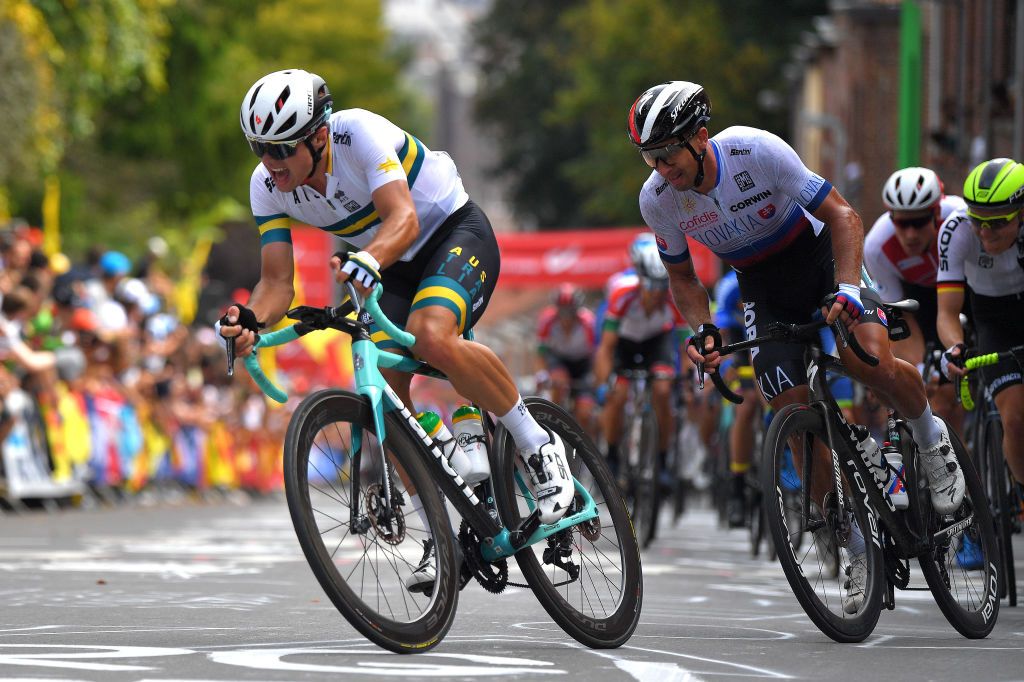 LEUVEN BELGIUM SEPTEMBER 26 LR Robert Stannard of Australia and Peter Sagan of Slovakia compete during the 94th UCI Road World Championships 2021 Men Elite Road Race a 2683km race from Antwerp to Leuven flanders2021 on September 26 2021 in Leuven Belgium Photo by Luc ClaessenGetty Images