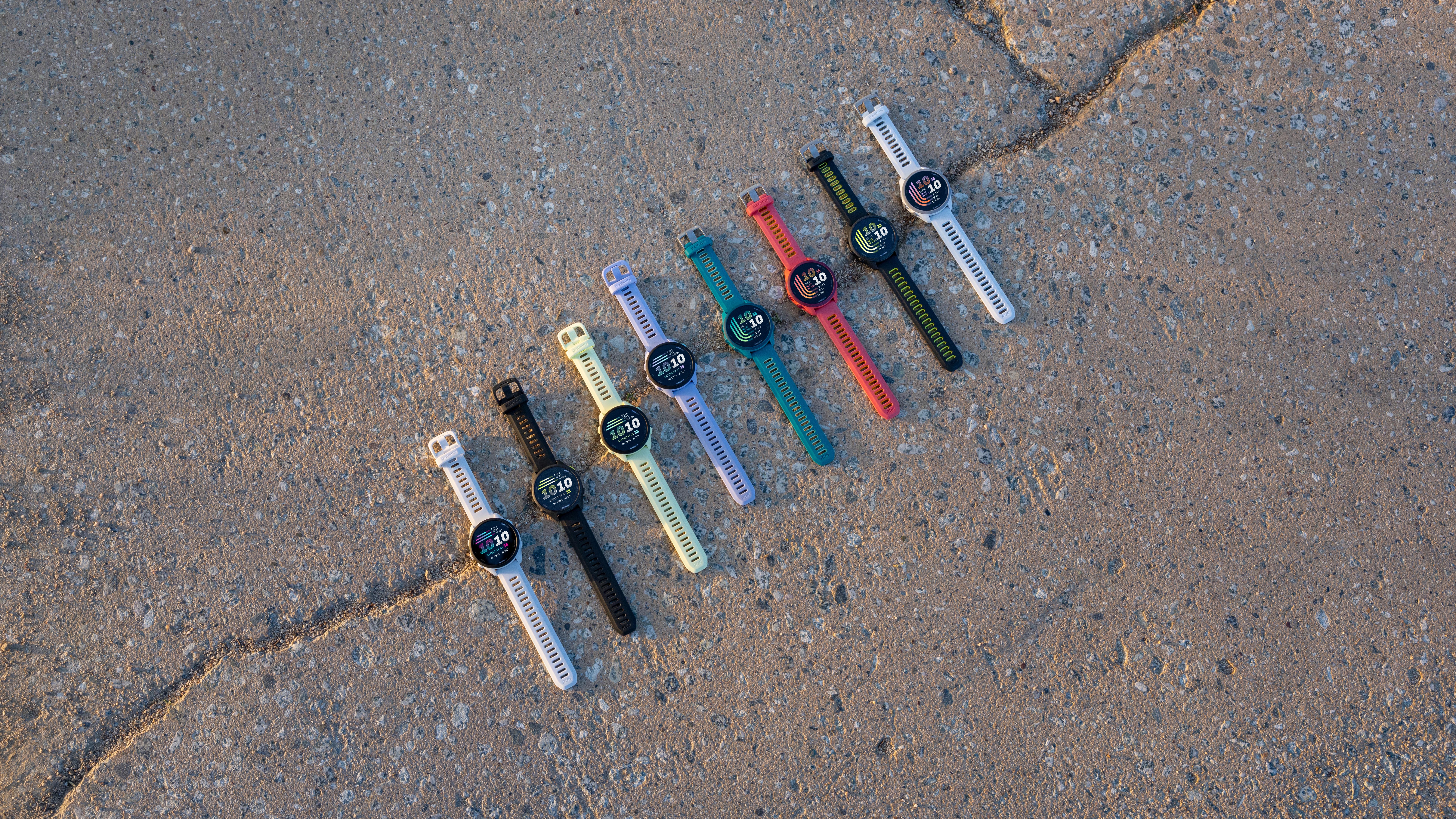 a photo of the lineup of the Garmin Forerunner 70 and Garmin Forerunner 170