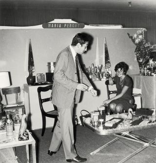 Man and woman at the exhibition stand