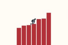 Woman climbing on large red bar graph