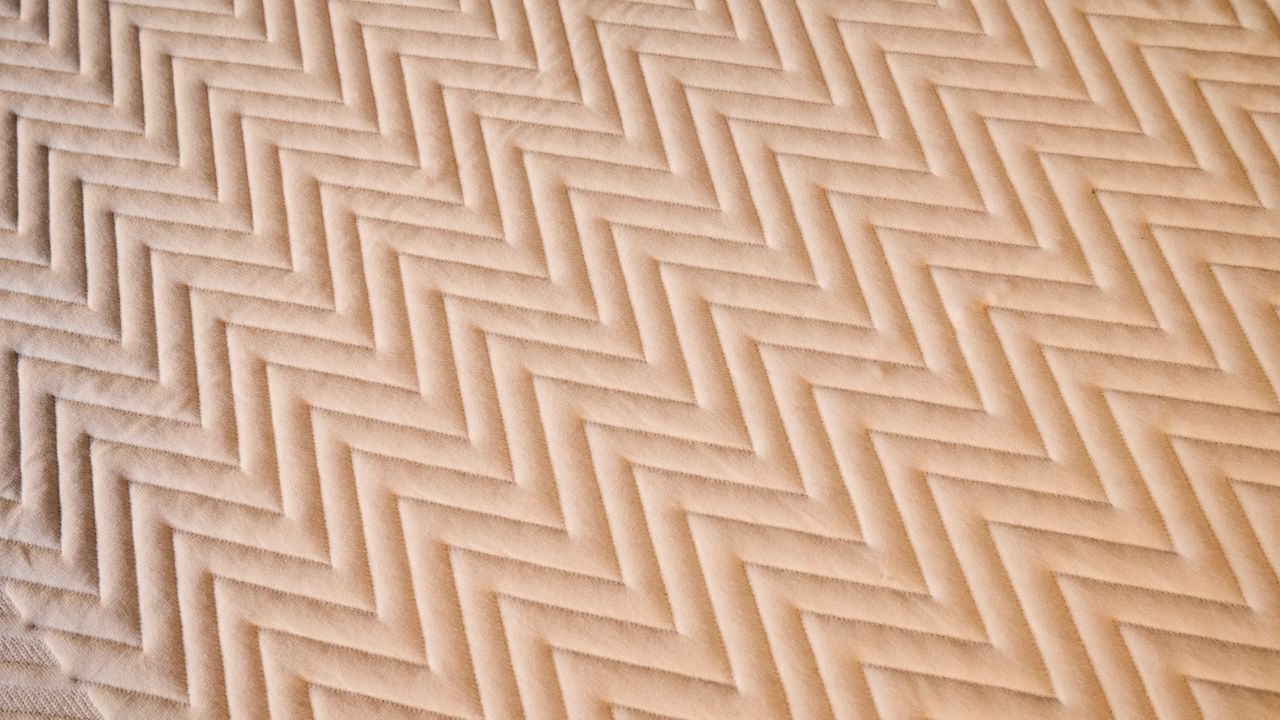 A close-up shot of the Leesa Legend Hybrid's cotton-Merino wool mattress cover