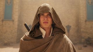 Rand al'Thor (Josha Stradowski) wearing a hood in "The Wheel of Time" season 2