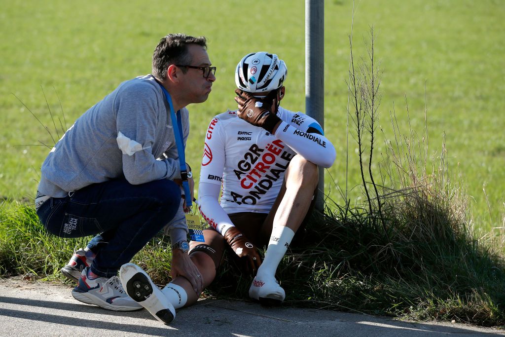 NINOVE BELGIUM FEBRUARY 26 Lawrence Naesen of Belgium and AG2R Citren Team injured after being involved in a crash during the 77th Omloop Het Nieuwsblad 2022 Mens Race a 2042km race from Ghent to Ninove OHN22 FlandersClassic WorldTour on February 26 2022 in Ninove Belgium Photo by Bas CzerwinskiGetty Images