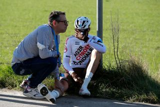 NINOVE BELGIUM FEBRUARY 26 Lawrence Naesen of Belgium and AG2R Citren Team injured after being involved in a crash during the 77th Omloop Het Nieuwsblad 2022 Mens Race a 2042km race from Ghent to Ninove OHN22 FlandersClassic WorldTour on February 26 2022 in Ninove Belgium Photo by Bas CzerwinskiGetty Images