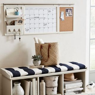 Organization system above an entryway bench