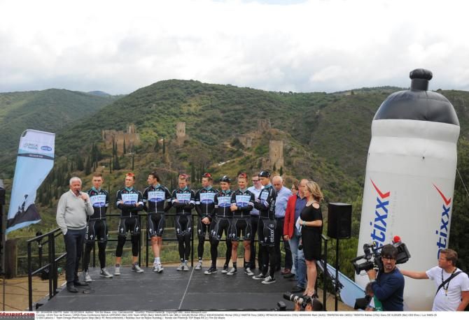 Patrick Lefevere with his team making the announcement of a new sponsor name for 2015