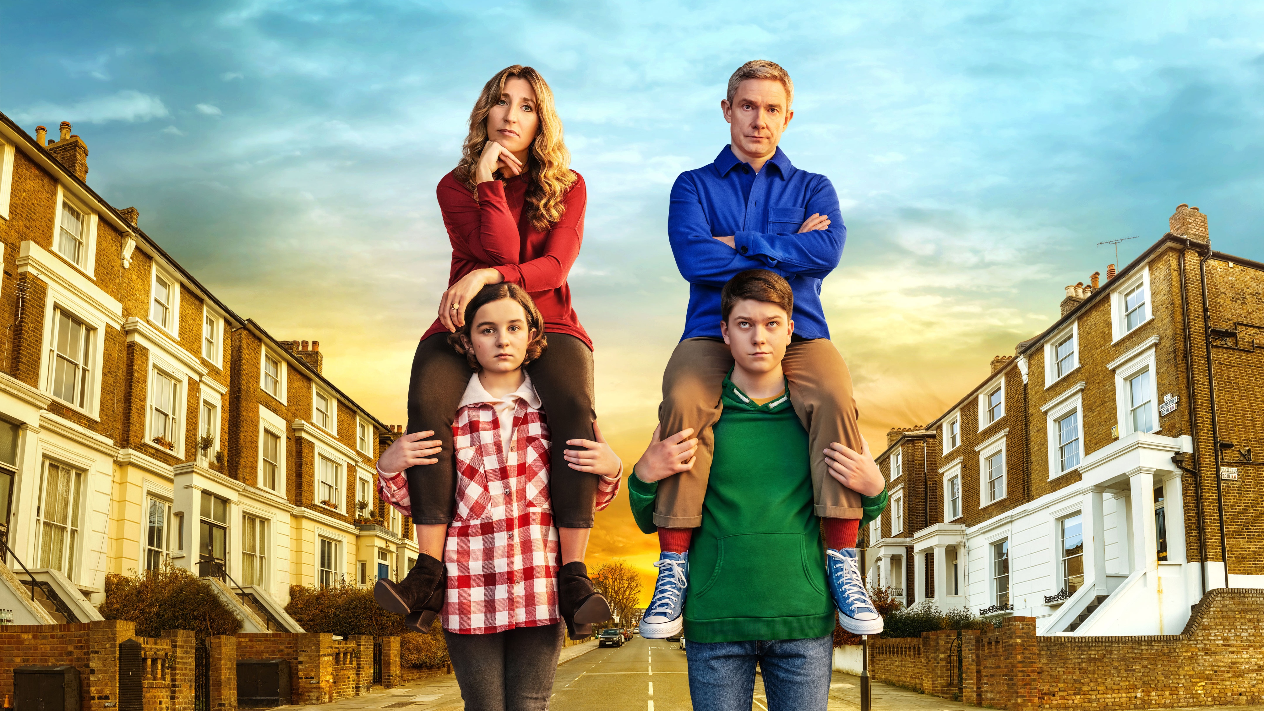 Breeders key art. Ally sits on the shoulders of Ava and Paul sits on the shoulders of Luke on a street.