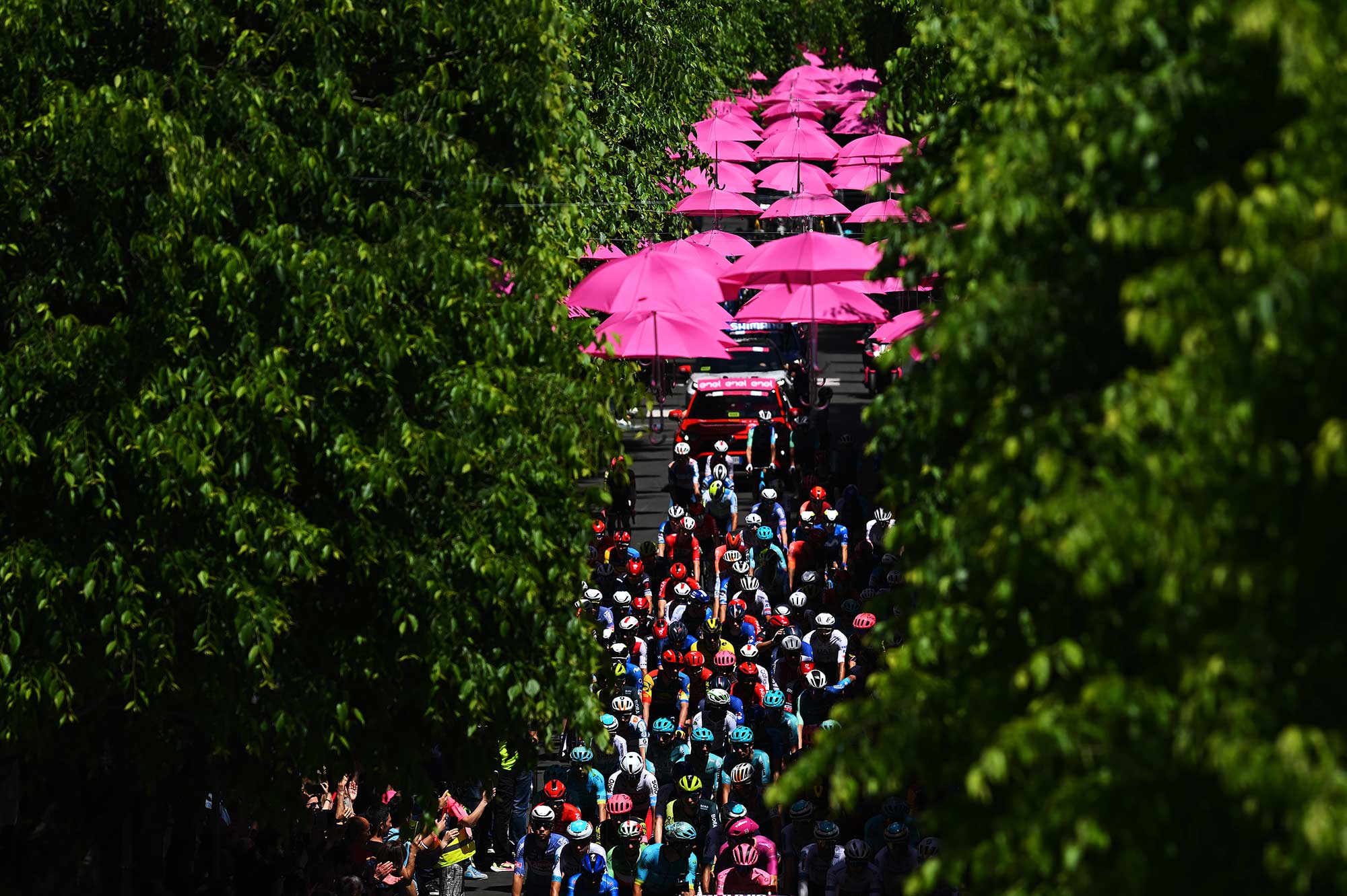 AVEZZANO ITALY MAY 12 A general view of Daniel Martinez of Colombia and Team BORA hansgrohe Blue Mountain Jersey Jonathan Milan of Italy and Team Lidl Trek Purple Points Jersey Tadej Pogacar of Slovenia and UAE Team Emirates Pink Leader Jersey Cian Uijtdebroeks of Belgium and Team Visma Lease a Bike White best young jersey Romain Bardet of France and Team dsmfirmenich PostNL and a general view of the peloton competing prior to the 107th Giro dItalia 2024 Stage 9 a 214km stage from Avezzano to Naples UCIWT on May 12 2024 in Avezzano Italy Photo by Dario BelingheriGetty Images