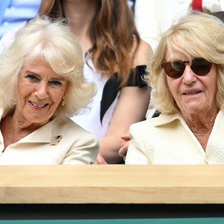 Queen Camilla and her sister, Annabel Elliot, both have coifed blonde hair as they watch Wimbledon in 2024