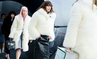 Female models in fur jackets/coats on the runway of Louis Vuitton A/W 2015 fashion show