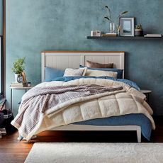 teddy fleece duvet on bed in blue bedroom