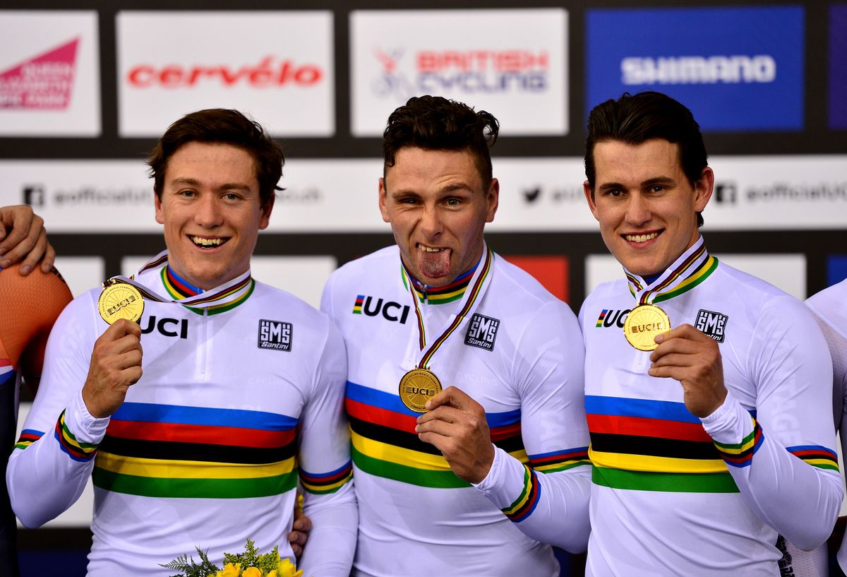 The Kiwi trio of Ethan Mitchell, Edward Dawkins and Sam Webster pose with their gold medals