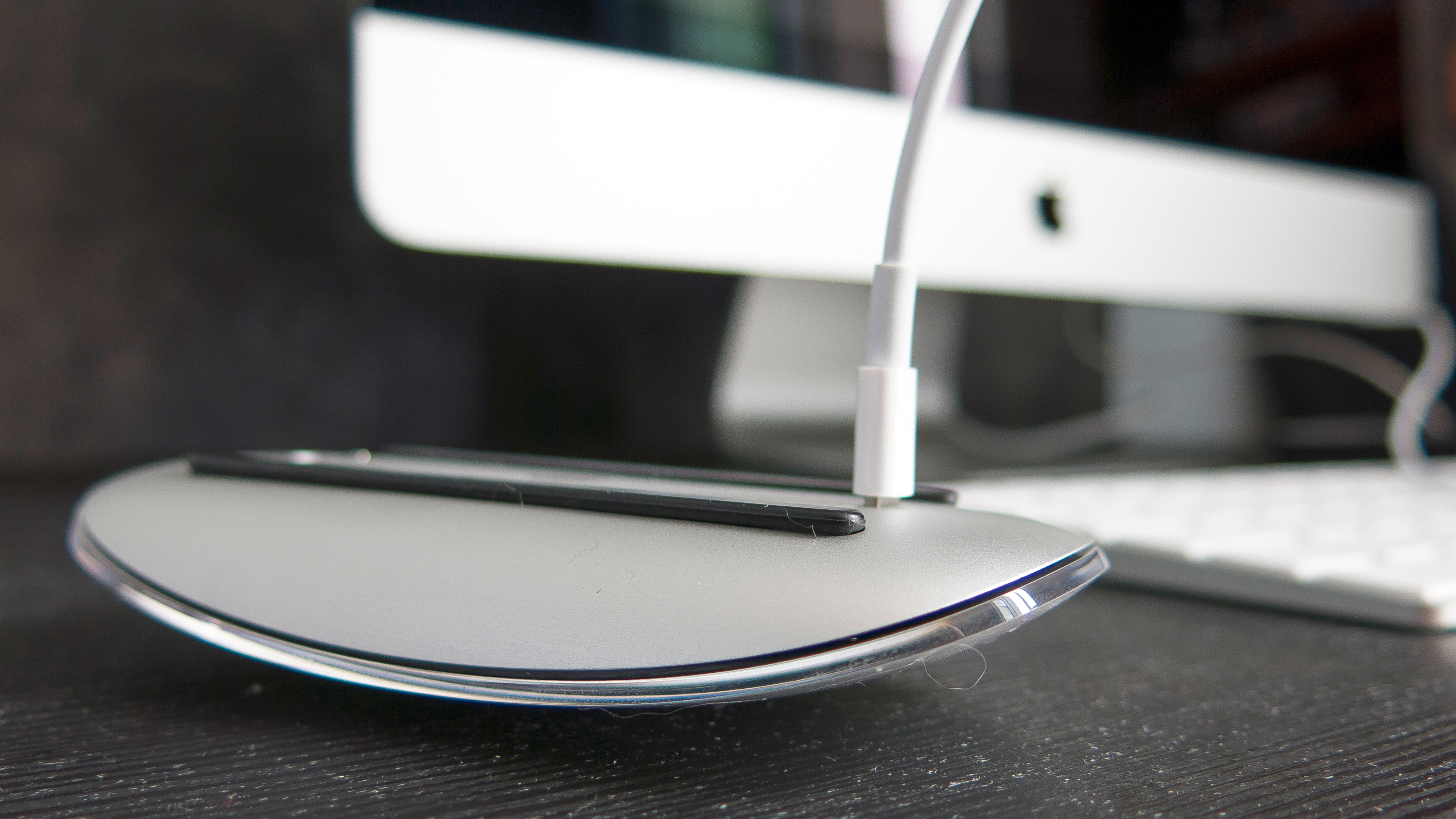 Apple Magic Mouse flipped upside down to charge