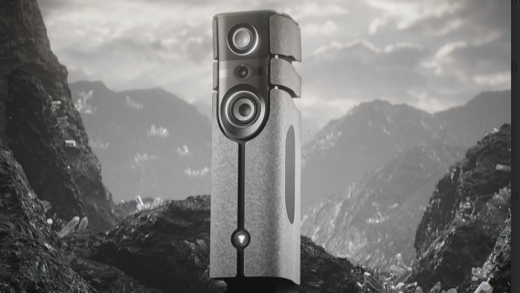 Focal Diva Alta Utopia wireless floorstanding speaker in grey on a grey mountainous background