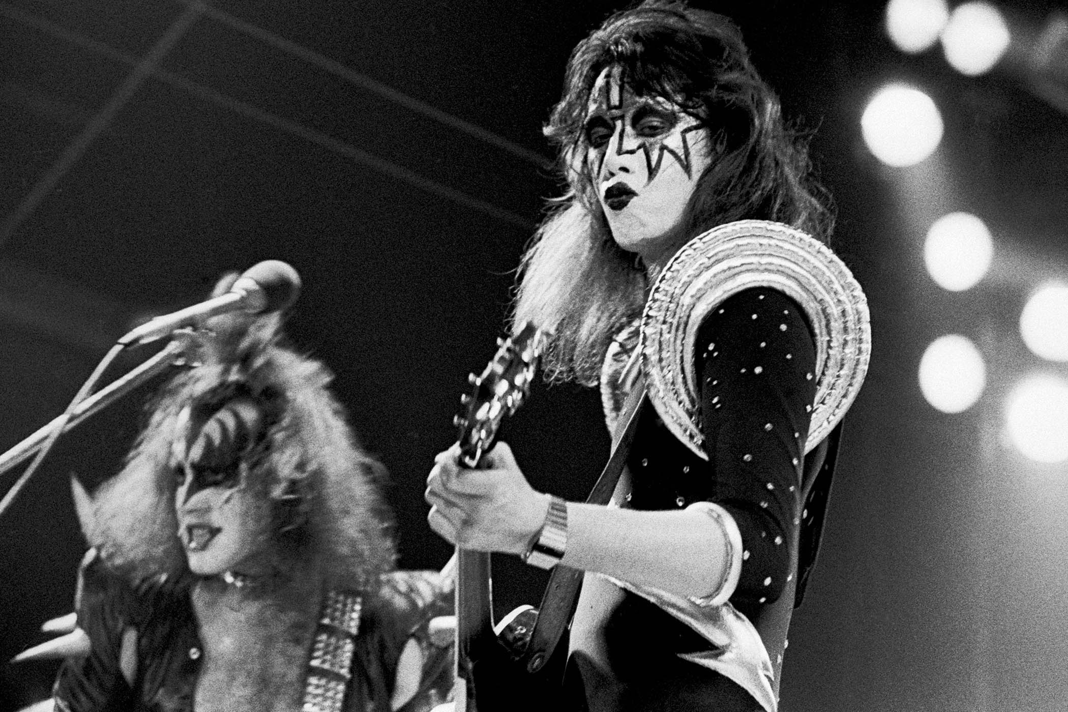 Gene Simmons and Ace Frehley of Kiss perform in 1976