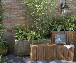 small patio with seating and planters