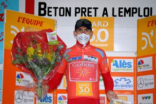 LA CALMETTE FRANCE FEBRUARY 04 Podium Christophe Laporte of France and Team Cofidis Solutions Credits Orange Leader Jersey celebrate during the 51st toile de Bessges Tour du Gard 2021 Stage 2 a 154km stage from SaintGenis to La Calmette Mask Covid safety measures Trophy Flowers EDB2020 on February 04 2021 in La Calmette France Photo by Luc ClaessenGetty Images