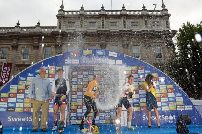 The first three overall: Bradley Wiggins (1st), Martin Elminger (2nd) and Simon Yates (3rd)