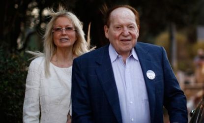 Sheldon Adelson and his wife, Miriam, leave Mitt Romney's foreign policy speech in Jerusalem on July 29, 2012.