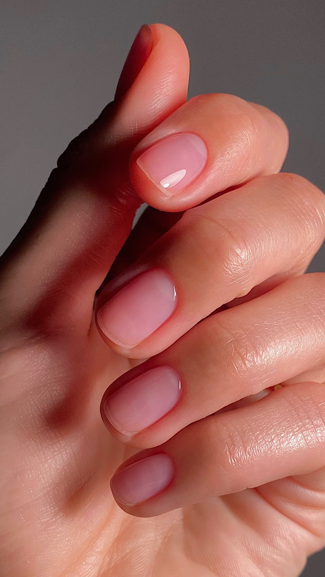 Sheer pink nail colour
