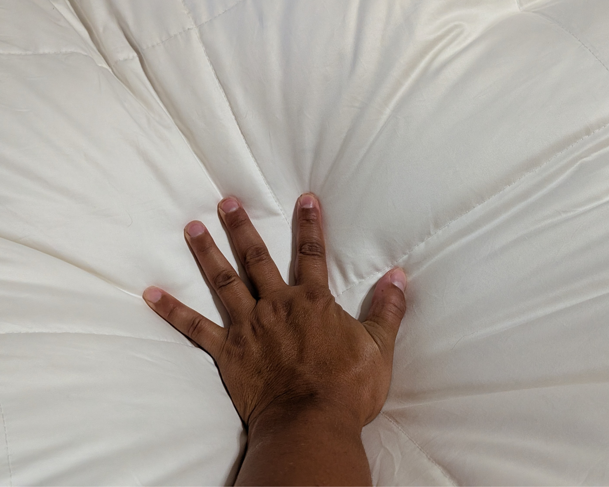 Up-close look at the Avocado Down Mattress Topper.