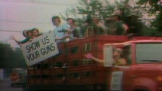 The cast riding around on a truck saying "Show Us Your Guns" on SNL.