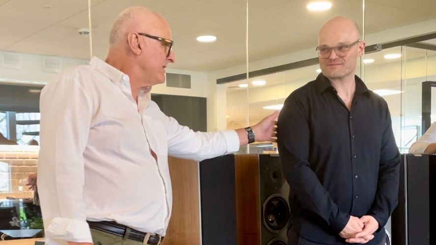 Audiovector&#039;s Ole and Mads Klifoth, in Copenhagen, with Ole patting his son on the back