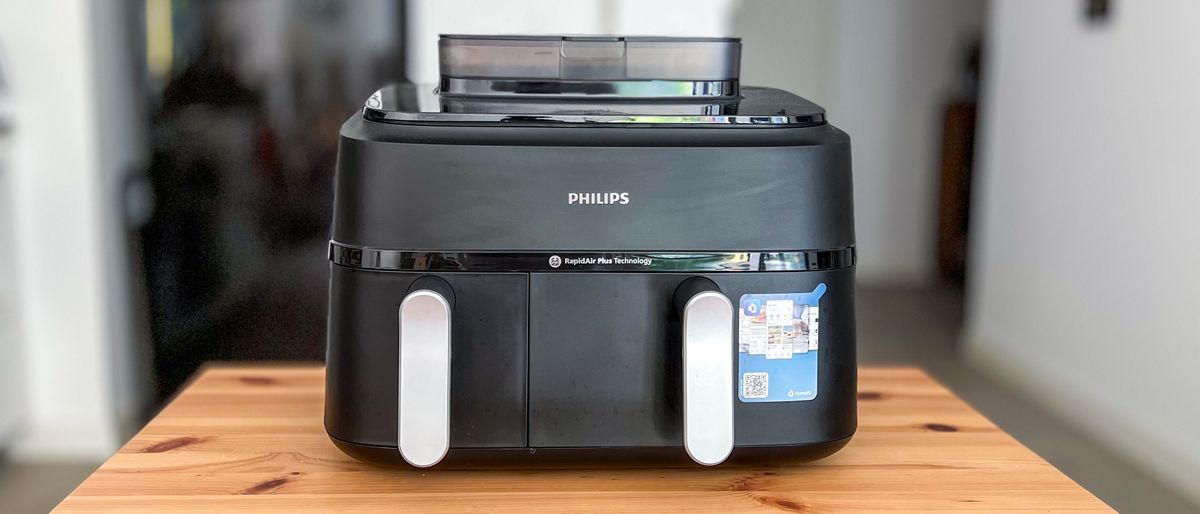 The Philips 5000 Series Dual Basket Air Fryer XXL Steam on a table