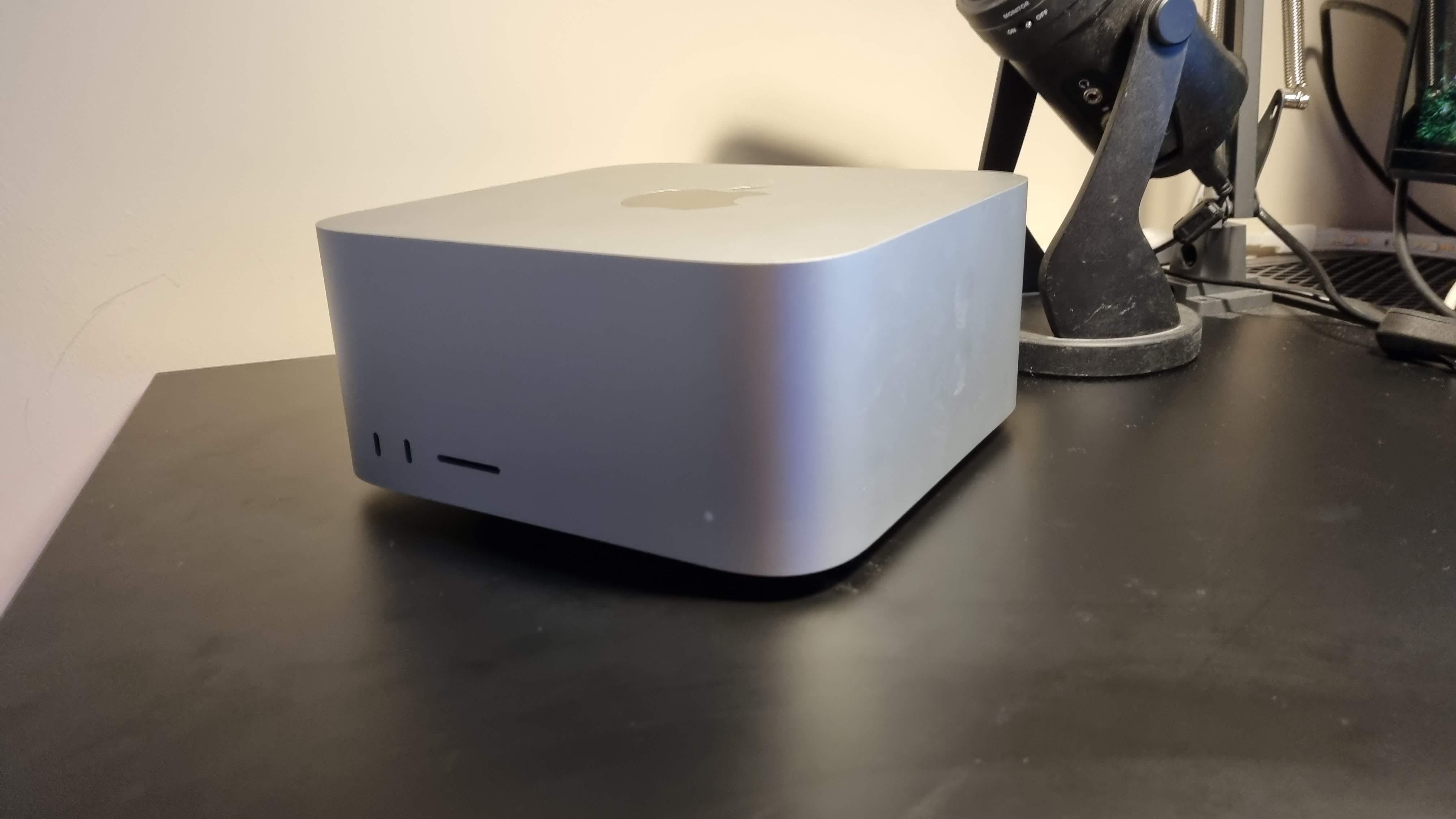 Mac Studio on a black desk