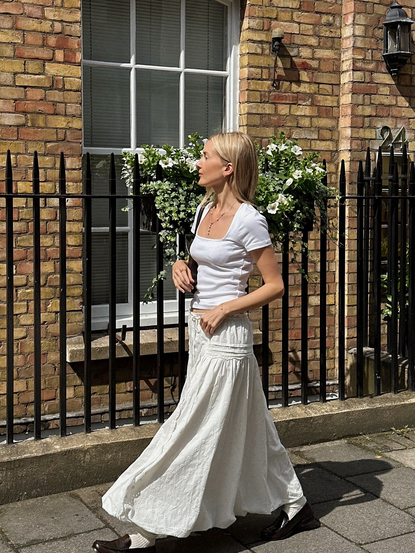 @chloekathbutler wearing a romantic skirt outfit.