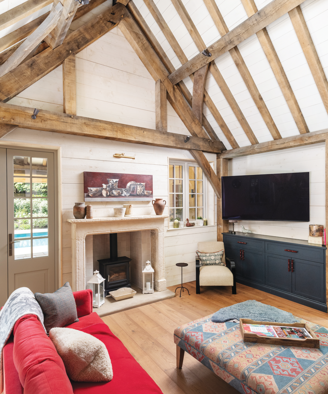 living room with wooden beam ceiling