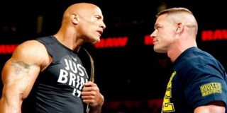 The Rock and John Cena squaring off