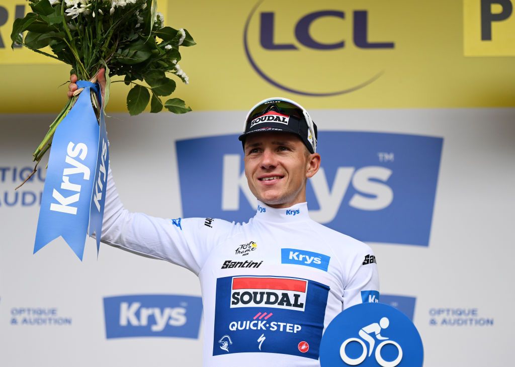 TORINO ITALY JULY 01 Remco Evenepoel of Belgium and Team Soudal QuickStep celebrates at podium as White Best Young Rider Jersey winner during the 111th Tour de France 2024 Stage 3 a 2308km stage from Piacenza to Torino UCIWT on July 01 2024 in Torino Italy Photo by Tim de WaeleGetty Images