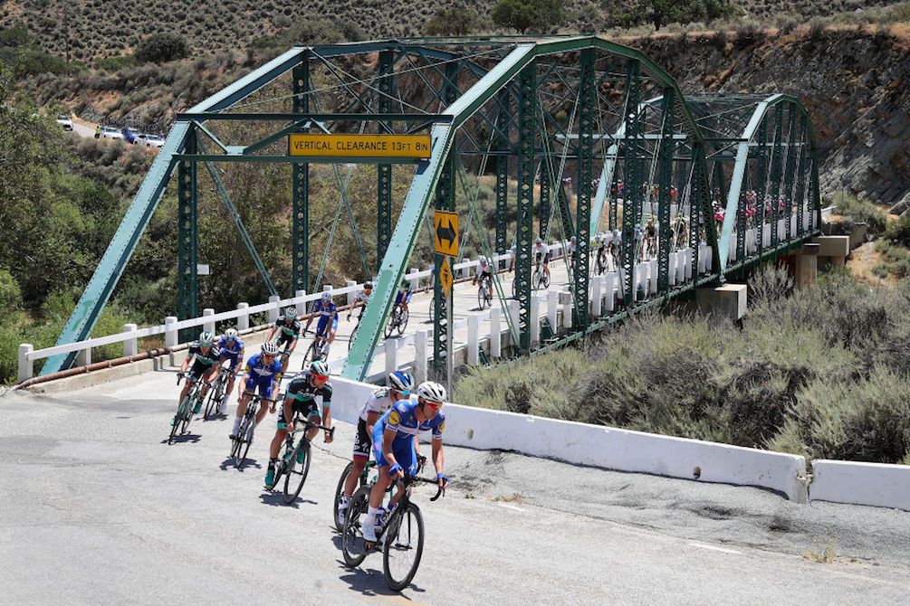 Bridging the gap: The riders of the 2018 Tour of California cross a river during stage 3