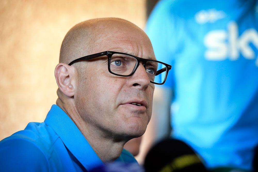 Dave Brailsford addresses the media.