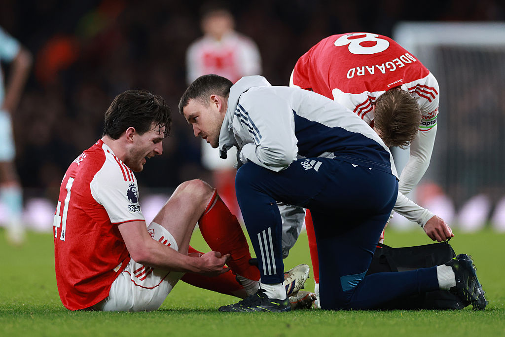 Declan Rice receives treatment while in action for Arsenal