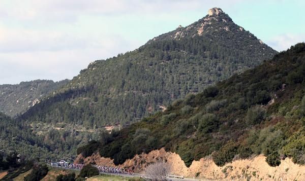 The peloton tackles some hilly terrain en route to Iglesias.