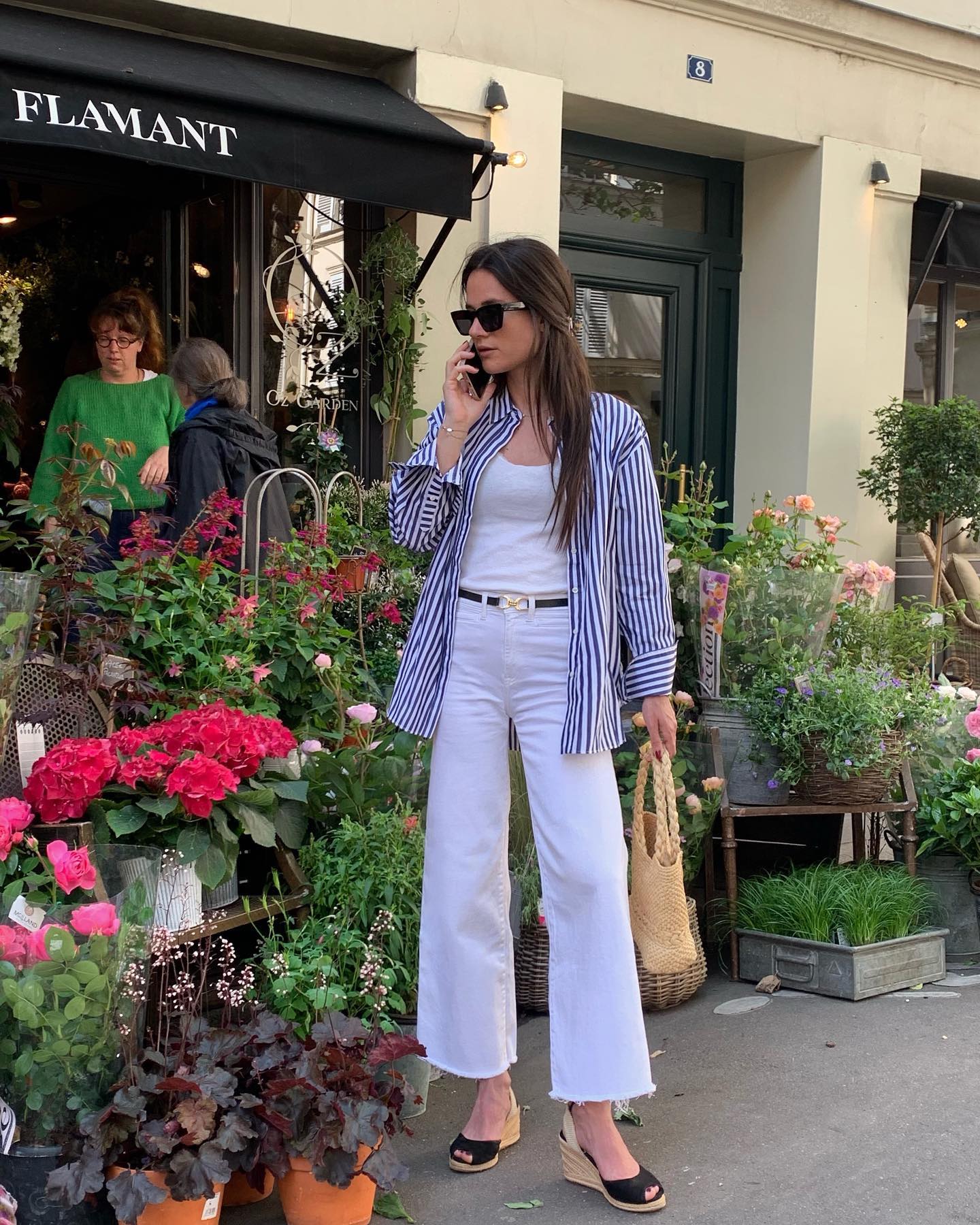 Instagram photo of Julie @leasy_inparis in striped shirt and white pants
