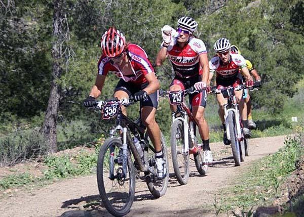 Kenda's Andy Schultz drives it at the front.