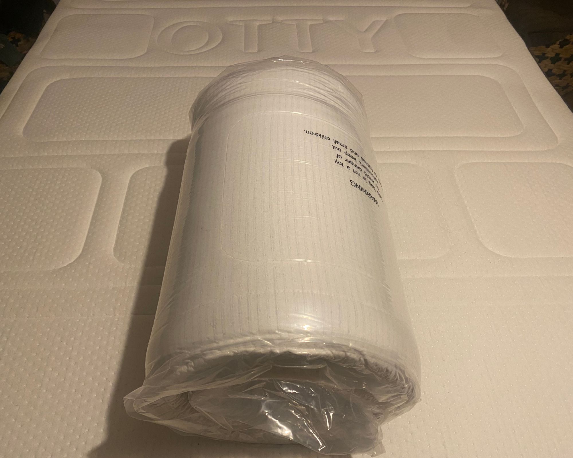 OTTY Mattress Topper rolled